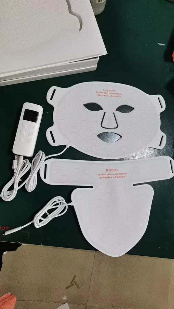 WHITE LED light therapy mask with red (630nm), blue (460nm), yellow (590nm), and infrared (850nm) light. Designed for skin rejuvenation, acne reduction, collagen production, and improved circulation. Features adjustable light intensity, independent infrared lamp control, and a customisable timer for targeted light therapy